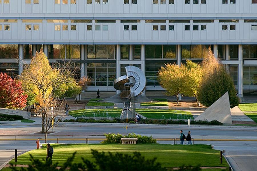 Sales counter with coffee machine in background and menu fixed to wall. 